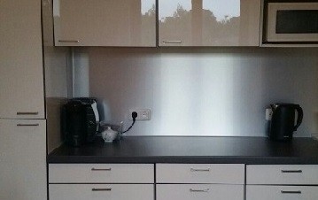 Brushed aluminium kitchen mirror