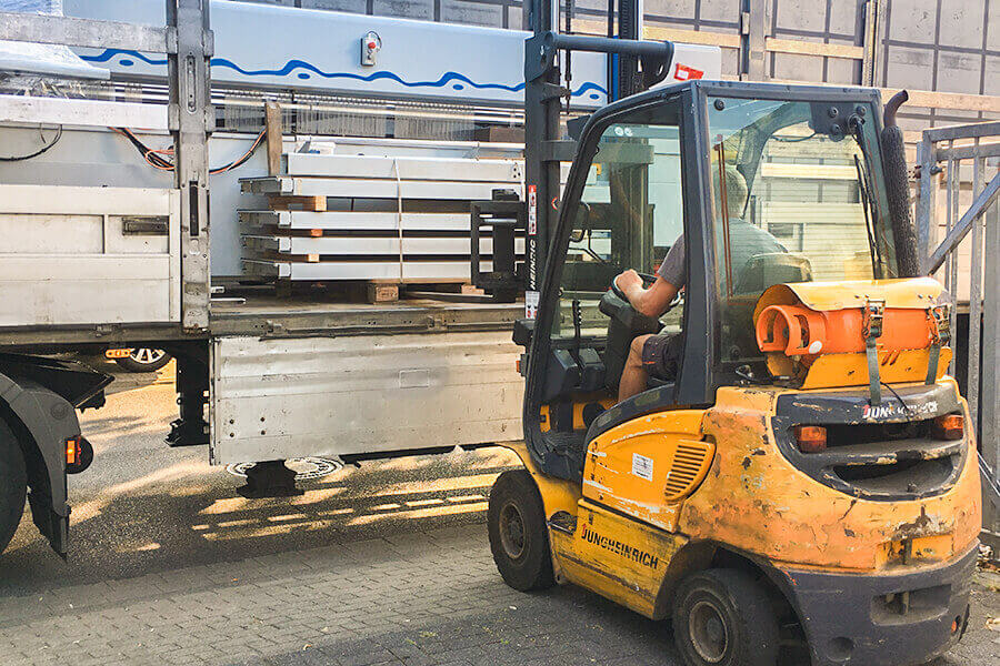 Unloading the air tables of our new panel saw