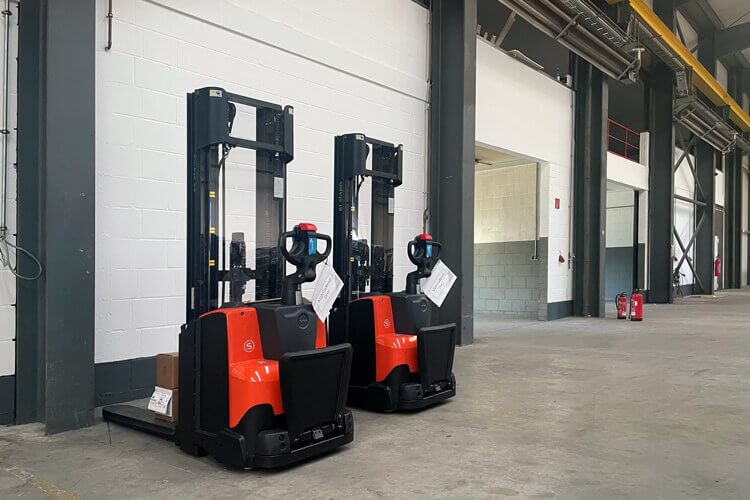 Two new electric high-lift trucks for the new magazine warehouse